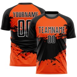 Aangepast oranje zwart-wit sublimatie voetbaltenue shirt