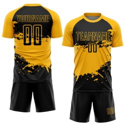 Aangepast zwart-gouden spatten sublimatie voetbaltenue-shirt