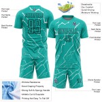 Aangepast Aqua Zwart-Wit Bliksem Sublimatie Voetbaltenue Jersey Aangepast Aqua Zwart-Wit Bliksem Sublimatie Voetbaltenue Jersey